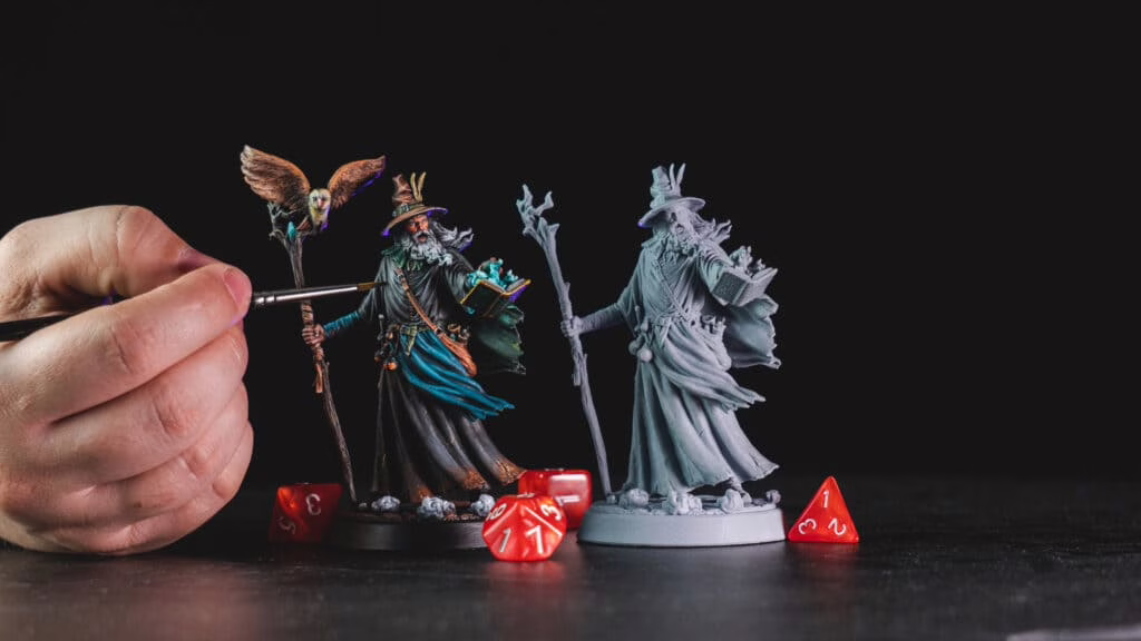 Loot Studio's miniature called Alberus Ribeirus from the bundle Wizards & Sorceres. There are two versions on the image: One painted and one not painted.